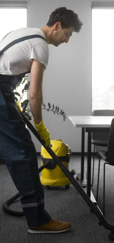 full-shot-man-cleaning-indoors